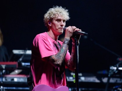 Machine Gun Kelly Hits L.A. Protests With ‘Silence Is Betrayal’ Sign