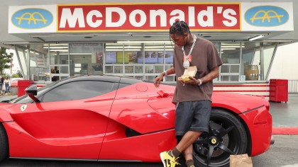 Travis Scott Turns Up With Fans At Oldest McDonald’s Restaurant To Celebrate His Meal’s Release