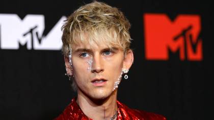 Watch Conor McGregor Throw A Drink At ‘Vanilla Boy Rapper’ Machine Gun Kelly On MTV VMA Red Carpet