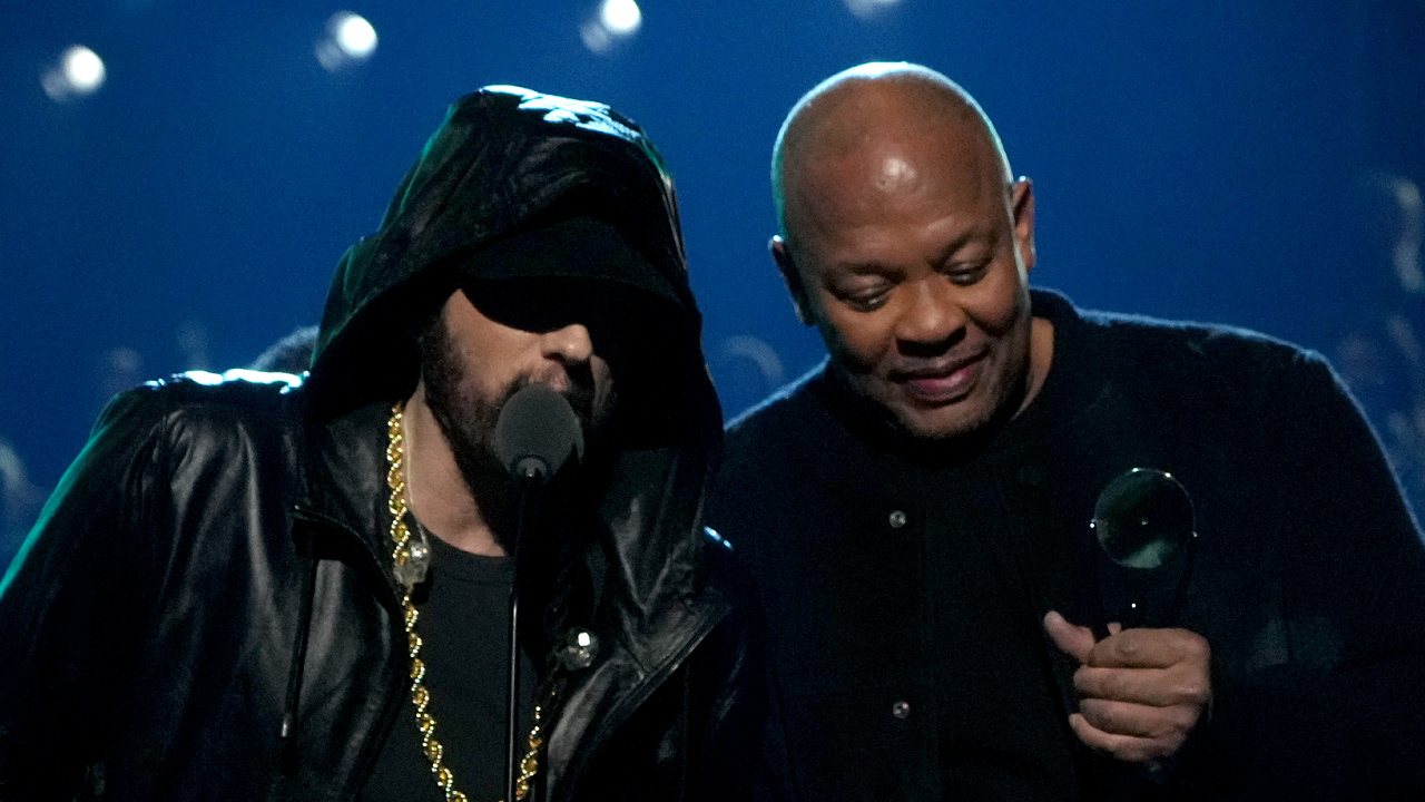 Eminem Inducted Into Rock & Roll Hall Of Fame By Dr. Dre - HipHopDX