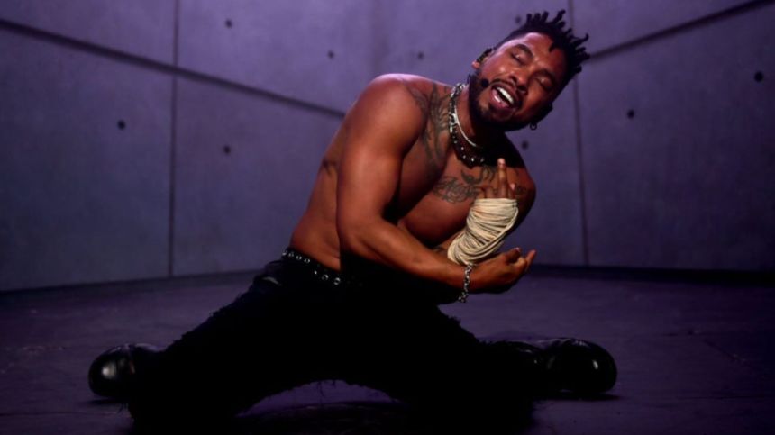 Miguel Performs Gruesome Body Suspension Show With Hooks In His Back
